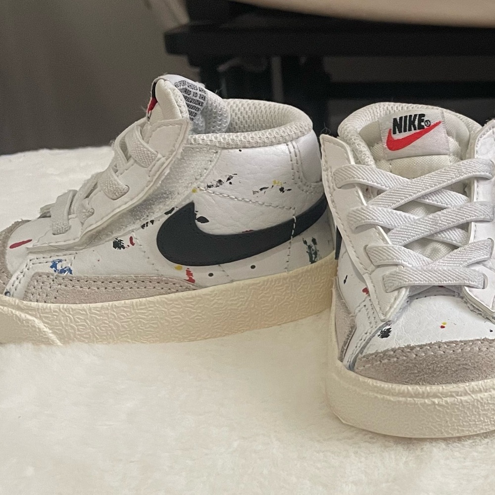Nike White and Black Sneakers with Mid-Top Design